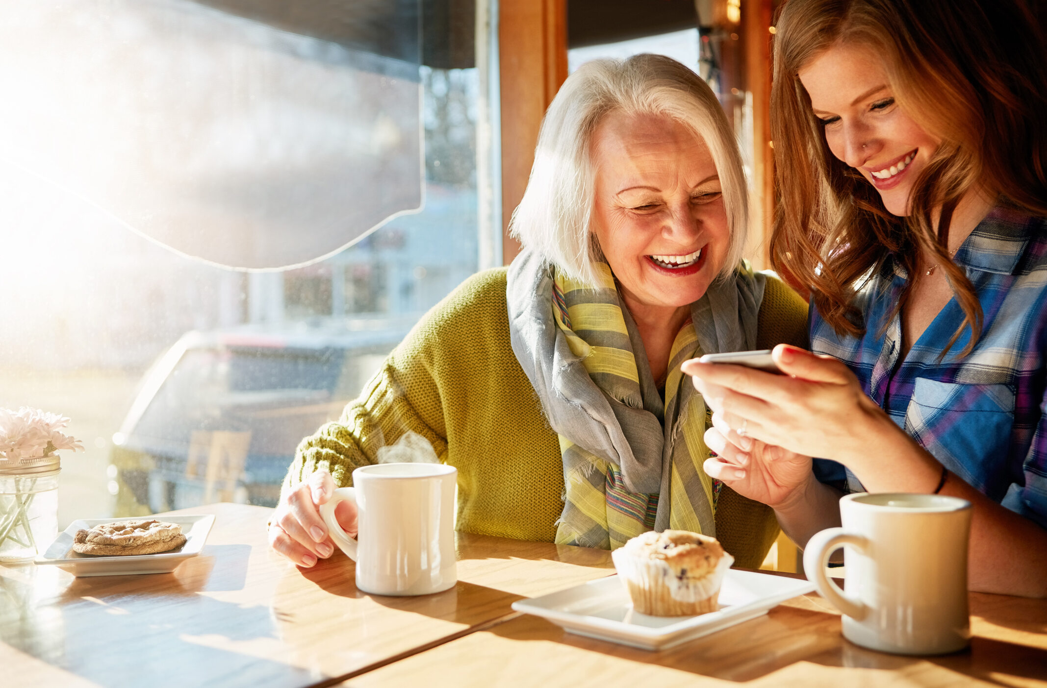 women looking at phone