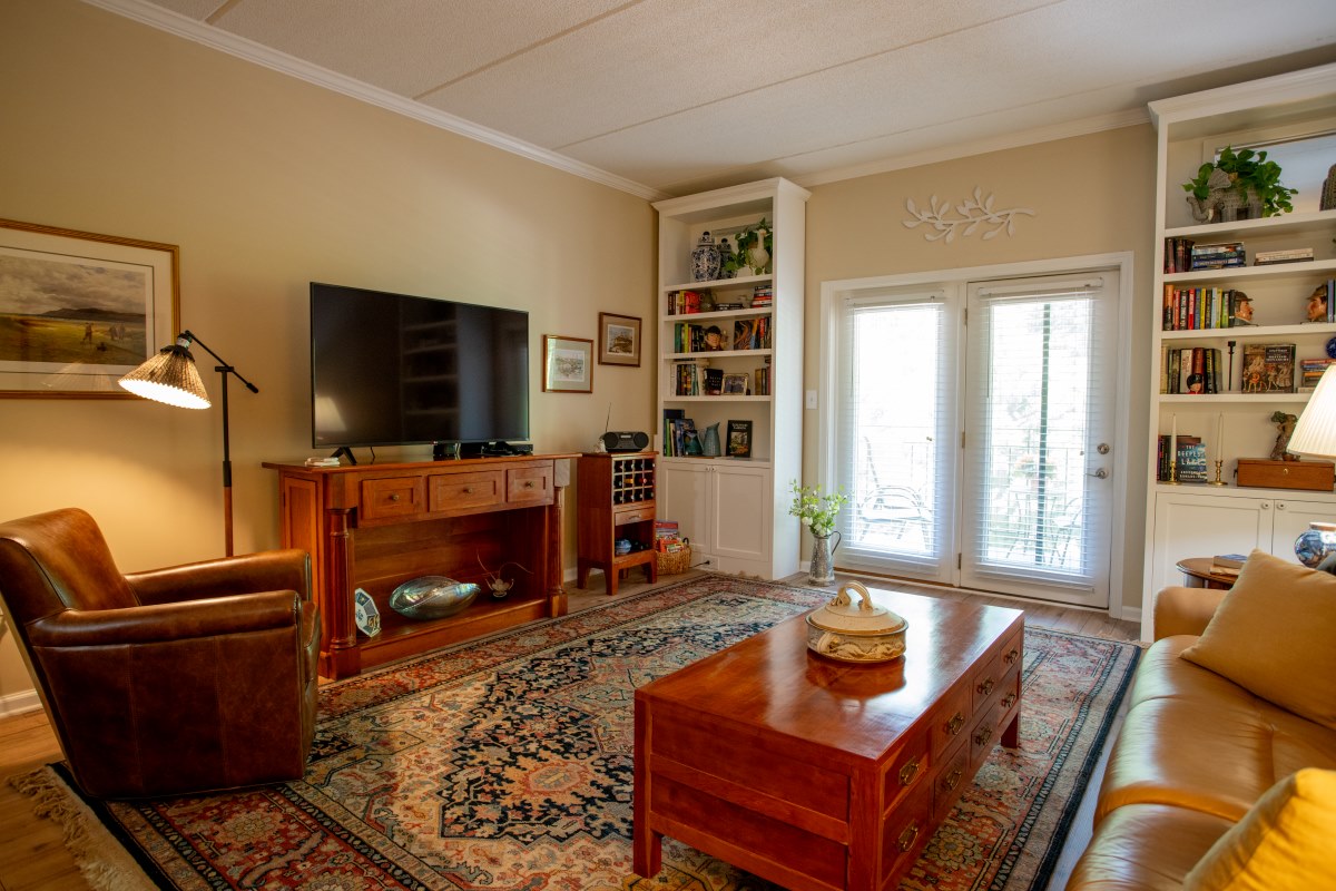 independent living space showcasing walkout balcony from living room