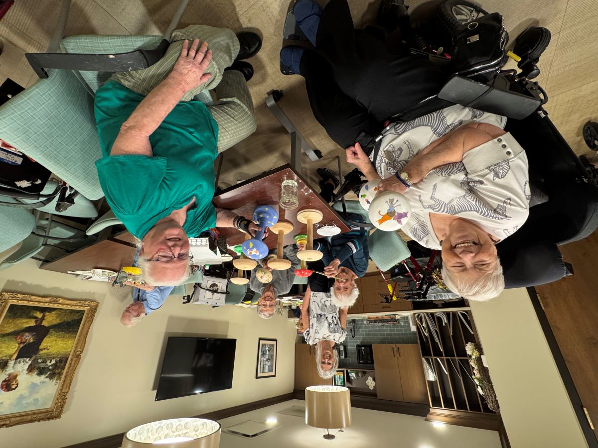 ladies painting wig stands